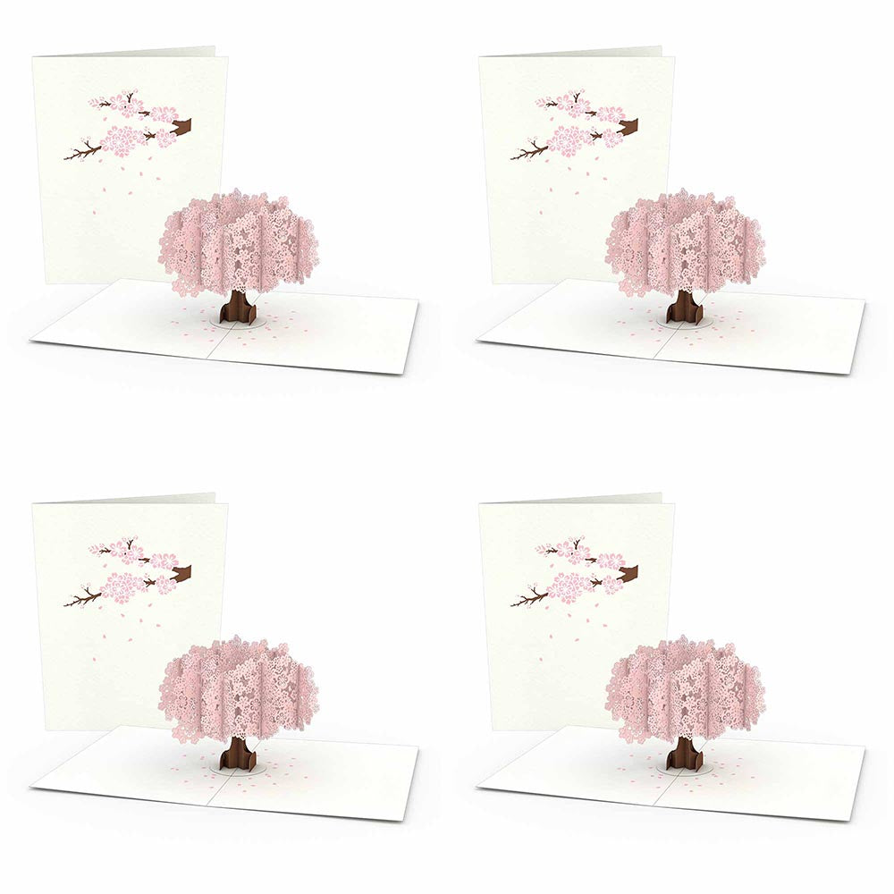 Four open Cherry Blossom notecards with pink paper blossom trees