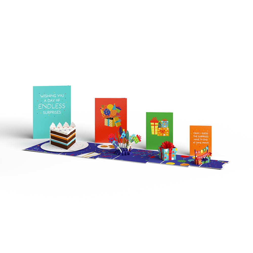 Four colorful birthday cards of different sizes with pop-up cake and birthday scenes